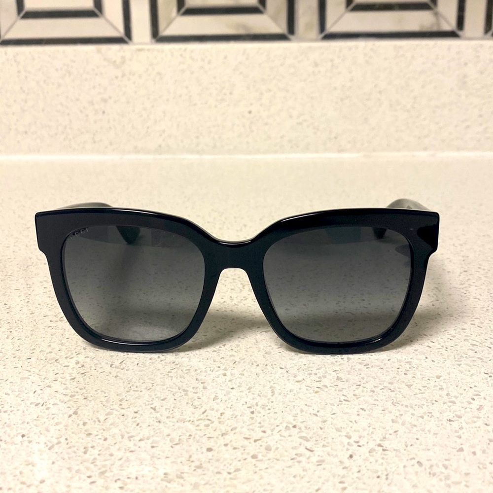 - Black Gucci Women’s Sunglasses